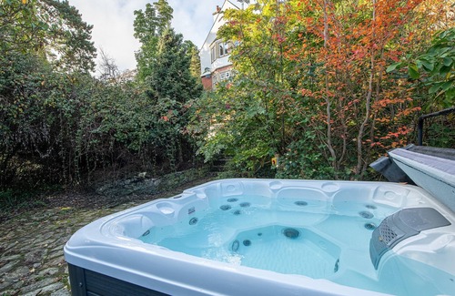 Menai Bridge House | Luxurious Arts and Crafts Home set in 5 Acres of Garden & Woodland onto Straits