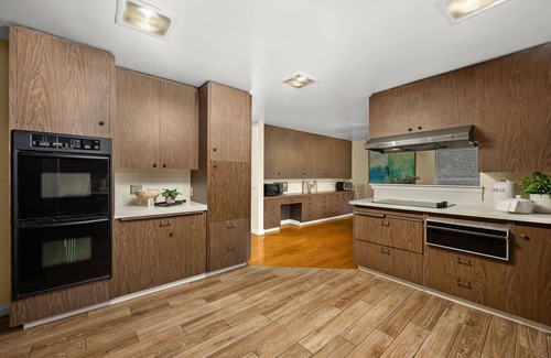 East Pasadena House | Luxurious large master bedroom with separate refrigerator coffee maker bathtub