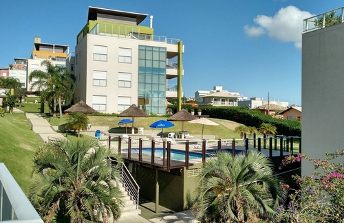 Santinho Apartment | Luxurious Sea Front Duplex with Resort structure in gated community.