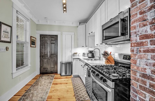 Bryant House | Luxury 3BR, 2 Full + 2 Half Baths/Walk to Elmwood/Garage/EV Charger/AC
