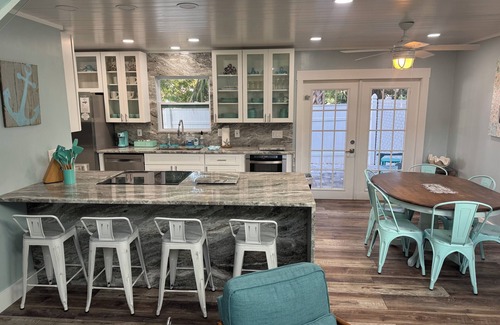 New Smyrna Beach House | Luxury 3BR Townhouse Walk to Beach Pet-Friendly Boat Parking Sleeps 10