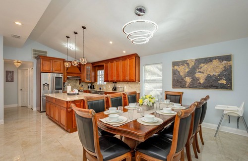 Dunedin House | Luxury 5 Bedroom Dunedin home ~ TWO full kitchens, heated pool, hot tub!