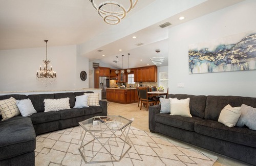 Dunedin House | Luxury 5 Bedroom Dunedin home ~ TWO full kitchens, heated pool, hot tub!