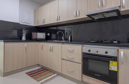 Urbanizacion Eliana Condo | Luxury Airport Penthouse - 3 BD 2 BA Suite + Rooftop Pool