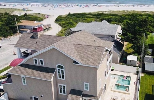 A-Zone House | Luxury Beach Front Estate With Pool & Hot Tub Sleeps 16