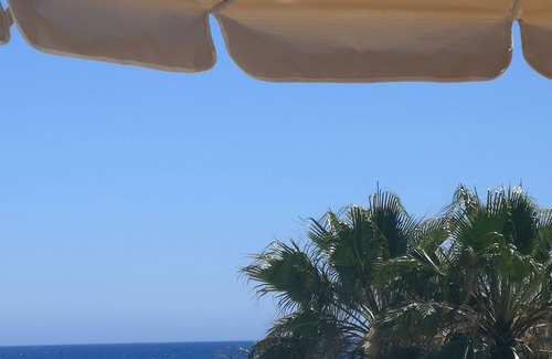 Costa Teguise Apartment | Luxury beachside villa with stunning sea views. Seven pools on complex!