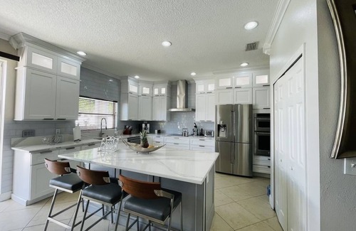 Trailer Estates House | Luxury Escapes Home with Heated Pool & Spa Near IMG and Siesta Key Beach.