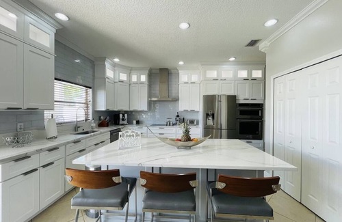Trailer Estates House | Luxury Escapes Home with Heated Pool & Spa Near IMG and Siesta Key Beach.