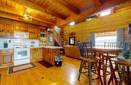 Baneberry Cabin | Luxury lakefront cabin with free attraction tickets, fire pit, dock & deck
