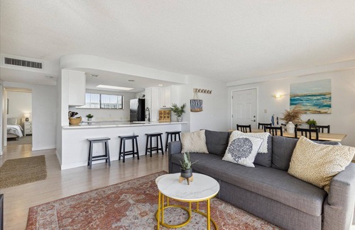 Avon By The Sea Condo | Luxury Oceanfront Getaway on the Top Floor Penthouse Corner Unit Steps from the Beach