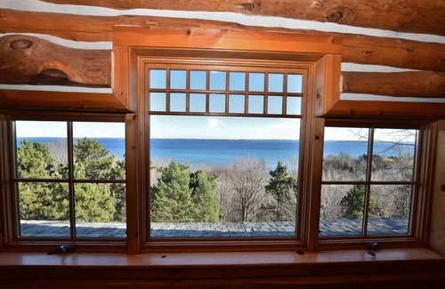 Suttons Bay House | Luxury Waterfront Log Home 15 min from Traverse City w/Dock