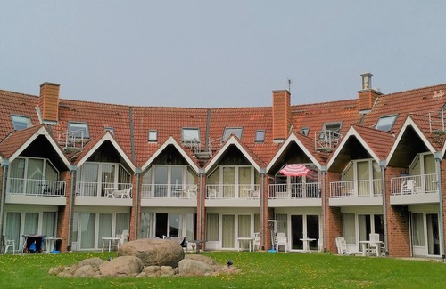 Kronsgaard Apartment | Lykkelig Ferie: bright apartment, south-facing balcony, beach 30 m, indoor pool, IR cabin, sauna