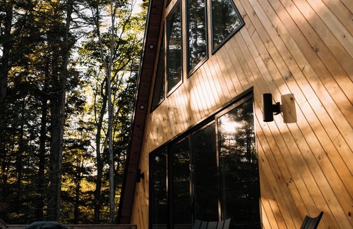 Mid-Coast and Islands Cabin | Maine Frame: Cozy Retreat in the Freeport Woods
