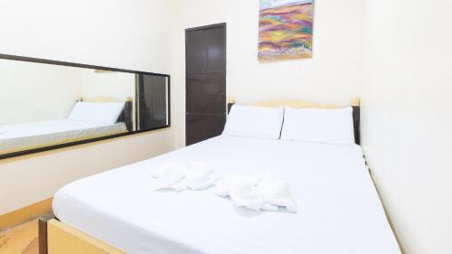 Tarlac Hotel | Maliwalo Inn Tarlac by RedDoorz