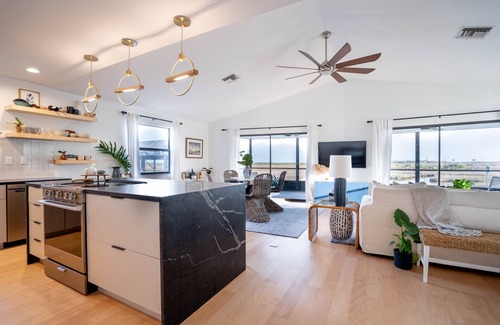 Spring Hill House | MarshaMellow A modern gulf coast Home! Fire pit, paddle boards, gas grill.