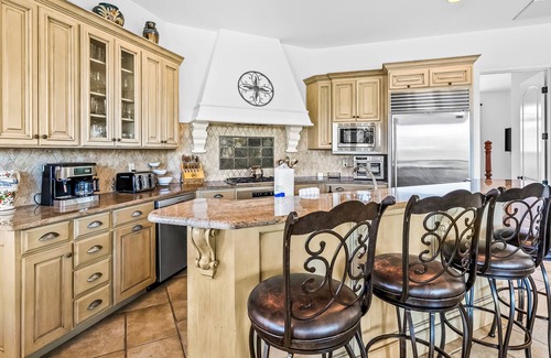 St. Tropez House | Mediterranean-style home with pool & hot tub access, W/D, AC & golf cart