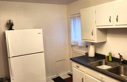 Godfrey House | Mid century + boho getaway on a quiet road in Godfrey. 2BR, 1 BA. WiFi included.