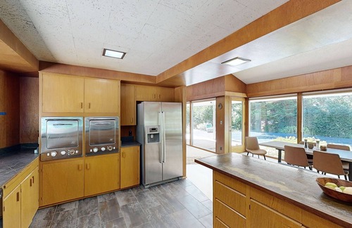 Sylvan-Highlands House | Mid-century modern home with pool, WiFi, BBQ grill, patio, and fireplace