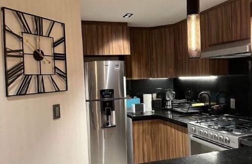 Colonia Cuauhtemoc Apartment | Mid-Century's Morning Embrace: Revel in 'Nowness' Amidst Roma's Radiance.n