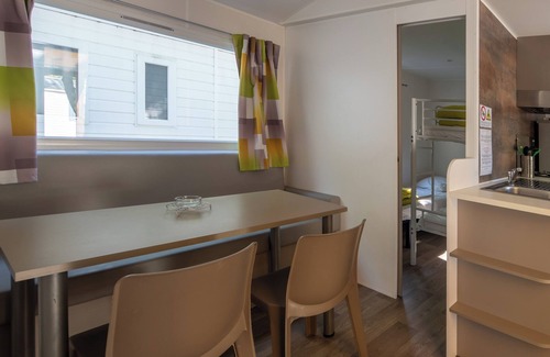 Lavilledieu RV Rental | Mobile Home 'Confort A - 1-5 Pers' with Shared Pool, Private Terrace and Communal Garden
