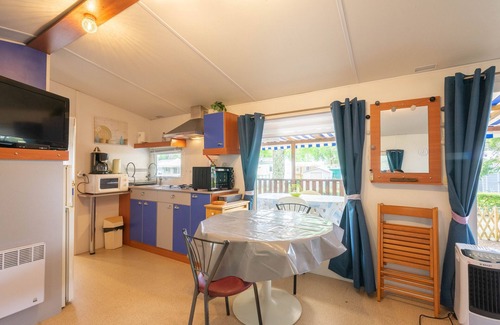 La Tremblade RV Rental | Mobile Home 'Mh 100 La Tremblade' with Shared Pool, Terrace and Private Garden