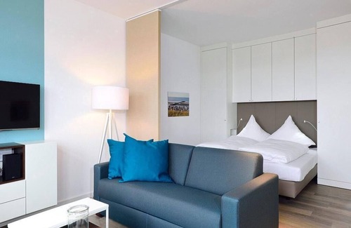 Wangerooge Apartment | Modernes Familienapartment am Inselstrand mit Meerblick, Balkon und Strandkorb!