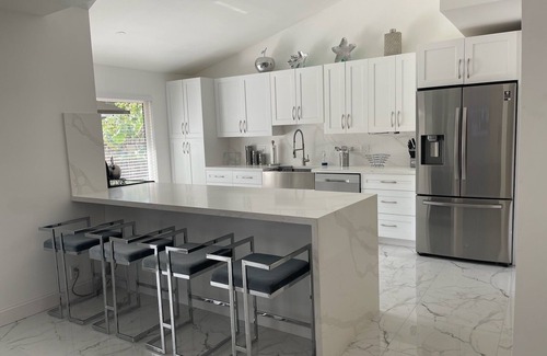 Lauderhill House | Modern 3-bedroom pool home with WiFi and AC 2 full bathroom in Lauderhill.