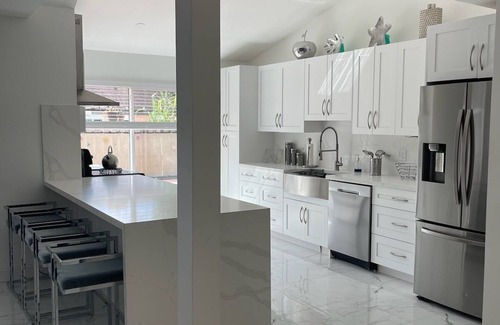 Lauderhill House | Modern 3-bedroom pool home with WiFi and AC 2 full bathroom in Lauderhill.