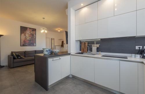 San Siro Apartment | Modern 3 br with balcony steps from San Siro by Rentopolis