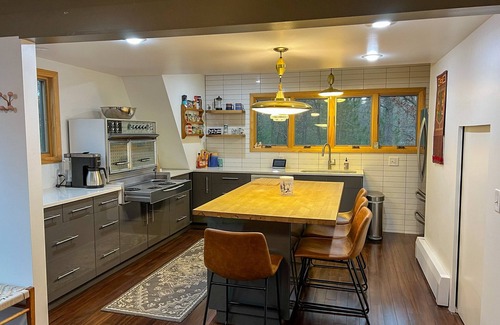 East Tawas Ski Chalet | Modern A-Frame on fenced, wooded Lot. Pet friendly!