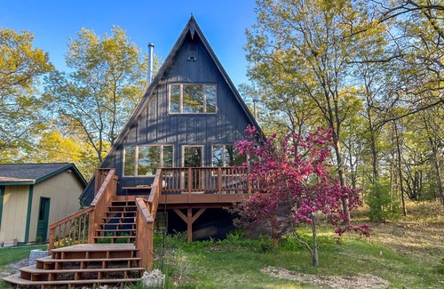 East Tawas Ski Chalet | Modern A-Frame on fenced, wooded Lot. Pet friendly!