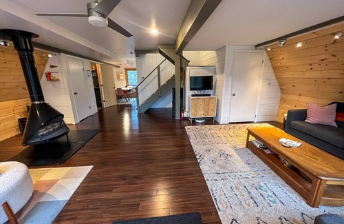 East Tawas Ski Chalet | Modern A-Frame on fenced, wooded Lot. Pet friendly!