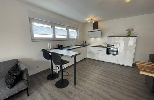 Losheim am See Apartment | Modern and centrally located holiday apartment with a large balcony.