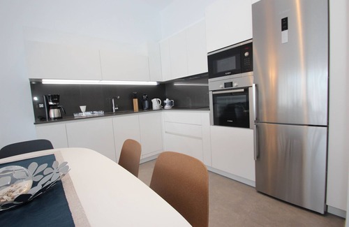 San Eugenio Apartment | Modern apartment, central location, 350 m to the beach, community pool