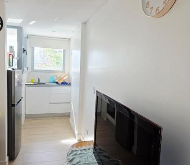 Constitucion Apartment | Modern apartment with a balcony and a heated pool