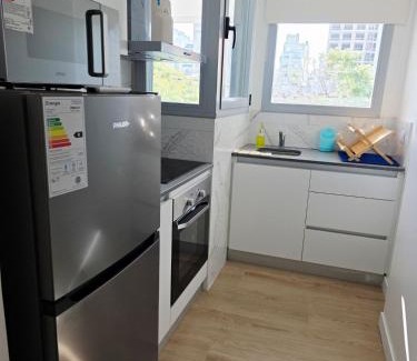Constitucion Apartment | Modern apartment with a balcony and a heated pool