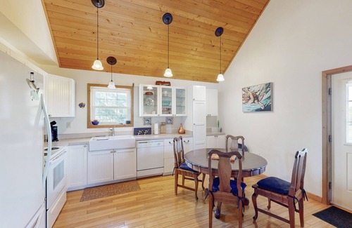Avon House | Modern Avon retreat with beach access, community pool, and stunning water views