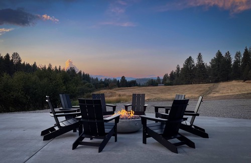 Clancy Cabin | Modern cabin on 10 creek front acres with large gas fire pit.