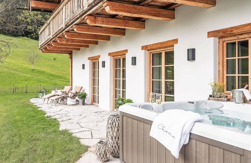 Frasdorf Apartment | Modern chalet style with private sauna, fireplace, hot tube, pool with Chiemsee view