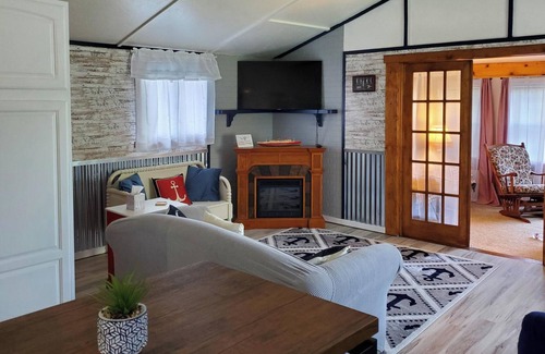 Evart Cottage | Modern cottage with dock and frontage on private lake.