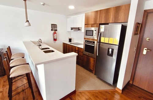 Financial District Apartment | Modern & Cozy Suite w/parking and laundry, Parque La Carolina.