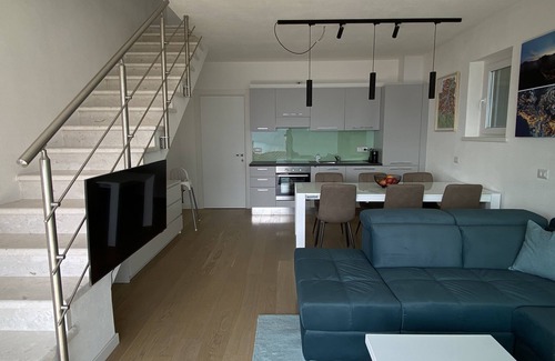 Dizzasco Apartment | Modern duplex apartment with magic views and pool over the lake.