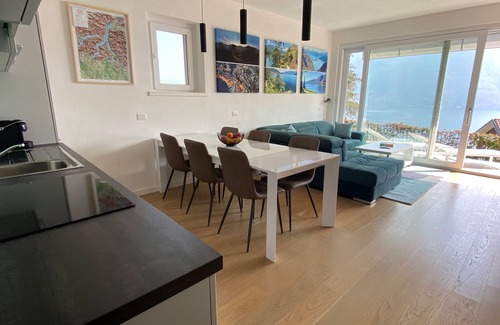 Dizzasco Apartment | Modern duplex apartment with magic views and pool over the lake.