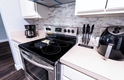 Oak Hill House | Modern Family Retreat w/Game Room and Fire Pit. Near NAS JAX