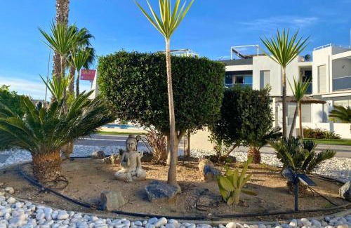 Orihuela Costa Apartment | Modern flat with swimming pool terrace and equipped solarium