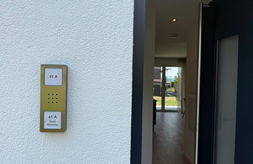 Unteruhldingen Apartment | Modern Harmony suite with covered terrace near the lake and beach in Uhldingen-