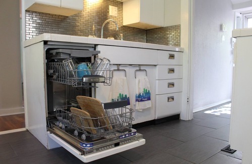 Westport House | Modern Home with Fenced Backyard. Walk to Westport Shops & Restaurants.