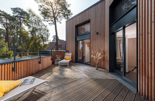 Postheim House | Modern house for 6 adults & 4 children with fireplace, roof terrace on the Lübbesee.
