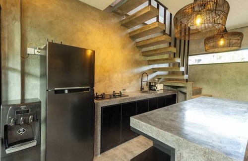 Padonan Apartment | Modern Industrial Haven: A 2-Bedroom Townhouse
