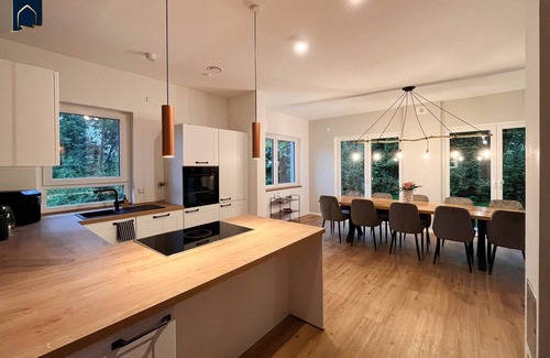 Usedom House | Modern natural idyll: Spacious vacation home near the Karnin lift bridge for 10 guests.